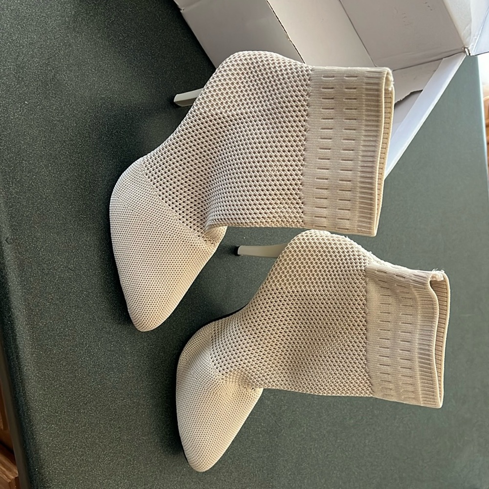 Ivory sick boots - never worn because they are not my size, brand new
